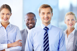 Confident team Portrait of a confident team with a handsome leader